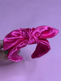 Diadema rosa fuschia con lazo